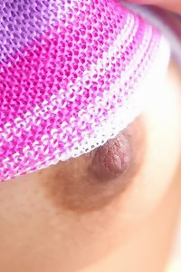 korean doll on sofa playing with her hairy gash